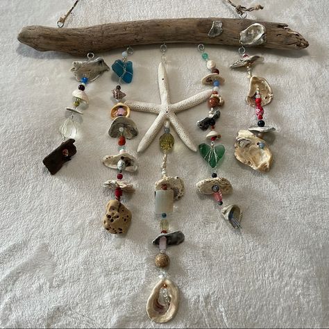 One Of A Kind Handcrafted Hanging Driftwood Ocean Sun Catcher Hand Picked Multi Color Sea Glass Hand Picked And Polished Sea Shells And Natural Driftwood Crystal And Gemstone Accents Aura Sun Catcher Window / Wall Decor Beachy Boho Aesthetic Beautiful Light Refraction In Daylight All Natural Driftwood, Sea Shells, Sea Glass And Sandstone/Holy Rock Hand Picked From Matagorda Beach Length From Driftwood To Longest Strand 20” Length From Rope To Longest Strand 30” Width 20” Stone And Driftwood Art, Sea Glass Hanging Art, Room Decor With Shells, Driftwood Sun Catcher, Ideas For Sea Shells Diy Seashell Crafts, Sea Witch Decor, Diy Seashell Wind Chime, Driftwood Crafts Wall Hangings, Hanging Seashells