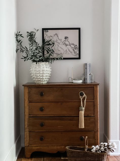 Styled this antique dresser with a mix of new items and vintage finds. And always add greens!! Vintage Wood Dresser Bedroom, Entry Table Dresser, Vintage Dresser Entryway, Antique Furniture Styling, Styling Antique Furniture, Antique Tall Dresser, Short Dresser Bedroom, Antique Dresser Entryway, Antique Wooden Dresser