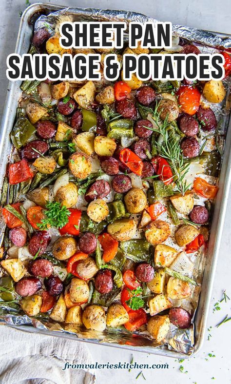 This hassle-free Sheet Pan Sausage and Potatoes is a one pan wonder that combines flavorful sausage, golden potatoes, vibrant peppers, and green beans. An easy, wholesome meal for a busy weeknight! Sheet Pan Sausage Potatoes Green Beans, Sheet Pan Sausage And Potatoes, Sausage Potatoes And Peppers, Sausage Sheet Pan Dinner, Sausage And Green Beans, Sheet Pan Sausage, Pan Sausage, Sausage And Potatoes, Golden Potatoes