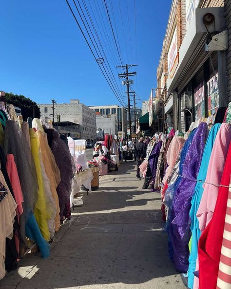 The LA Garment District was originally defined in1972 by the LA Times as being along Los Angeles Street from 3rd to 11th Street. The area was virtually unknown to most residents at the time. By 1982, the district had grown to a roughly 20 block area with about 500 retail outlets. Today, it has more than 4,000 independently owned retail and wholesale businesses selling apparel, footwear, accessories, and fabulous fabrics! #mre #margireed #garmentdistrict #losangeles #fashion Goth Stores, La Fashion District, Fashion District Los Angeles, Los Angeles Street, Block Area, Fabric Shopping, Fashion District, Fabulous Fabrics, La Fashion