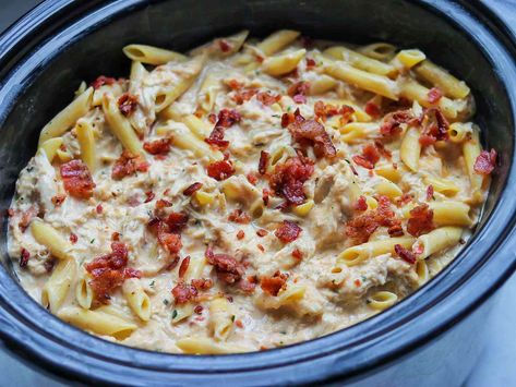 Prepping this chicken and bacon ranch pasta is beyond easy when everything is combined in a slow cooker. Chicken Bacon Ranch Crockpot, Chicken Bacon Ranch Bake, Penne Pasta Recipes, Crockpot Pasta, Chicken Bacon Ranch Pasta, Bacon Chicken, Ranch Pasta, Slow Cooker Pasta, Slow Cooker Recipe