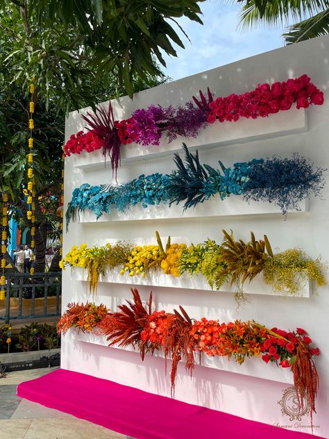 Your wedding deserves to be as colourful as this artwall of flowers. Designed specifically to add the pop of colour you need to enrich your wedding! #weddingdecor #weddingdecorideas #colourfulflowers #flowerembellishments #floralornaments #floralarrangement #samanidecorators #poppfcolour #weddingdecorinspiration #decorinspo #decorideas #weddinginspiration Ambience Decor, Flower Shop Interiors, Reception Stage Decor, Wedding Background Decoration, Tropical Bridal Showers, Valentine Images, Paper Flower Decor, Flower Installation, Carnival Themes