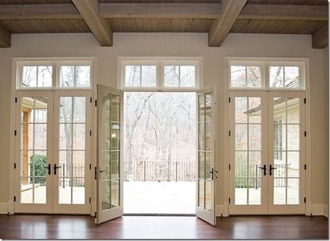 Loving the three sets of doors out onto the deck. I imagine the wooded area looks amazing in the warmer seasons. #decor #doors French Doors With Transom, Transom Windows, Floor To Ceiling Windows, Patio Doors, Double Doors, My Dream Home, Future House, French Doors, Architecture Details