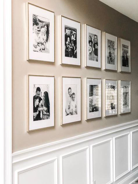 Wainscoting And Gallery Wall, Narrow Hallway Photo Wall Ideas, Pictures In Hallway Ideas, Wedding Photos Wall Display, Gallery Wall 6 Frames, Photo Wall Hallway, Display Wedding Photos At Home, Gold Frames On Wall, Empty Wall In Kitchen