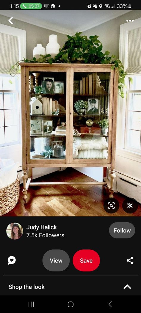 Decorating Armoire Tops, Vintage Two Door Cabinet, Decorating Top Of Buffet Cabinet, Green Modern Farmhouse Living Room, Display Case Makeover, Boho China Cabinet Display, Top Of Armoire Decor, Glass Cabinet Decor, Vintage China Cabinet