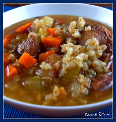 Ina's Rich Beef Barley Soup. My notes: Soak barley overnight and rinse off phytic acid. Replaced oxtails with 2.5 lb cubed chuck roast marinated in about 3/4 bottle red wine, 3 smashed garlic and 2 bay leaves- several hours to overnight. Added marinating juices to soup and 8 oz pkg mushrooms quartered to sautéed veggies. Bake in Dutch oven at 225 for 2 hrs or less. Cooking Barley, How To Cook Barley, Oxtail Soup, Oxtail Recipes, Beef Barley, Beef Barley Soup, Garlic Soup, My Notes, Barley Soup