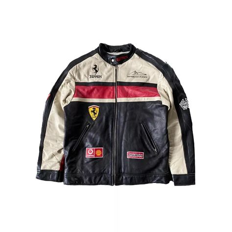 The **Ferrari Leather Racing Jacket** is a sleek, high-performance piece that combines Italian luxury with the thrill of motorsport. Crafted from premium-grade genuine leather, this jacket is designed to reflect the bold and sophisticated image of Ferrari, making it perfect for racing enthusiasts and those who appreciate fine craftsmanship. The jacket features the iconic Ferrari logo on the chest, symbolizing speed, power, and excellence. Engineered for both style and function, the Ferrari Leath Ferrari Leather Jacket, Racing Leather Jacket, Leather Racing Jacket, Motorbike Jackets, Ferrari Racing, Racing Jacket, Motorcycle Leather, Ferrari Logo, Vintage Leather Jacket