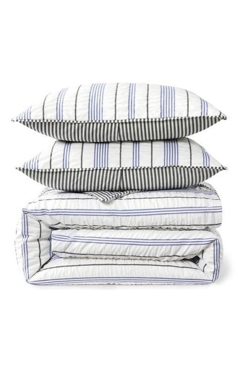 "Find DKNY Seersucker Stripe Duvet Cover & Sham Set on Editorialist. Yarn-dyed stripes add relaxed, refreshing style to a cotton-seersucker duvet set that's softly puckered for textural appeal. Queen set includes two Standard shams; King set includes two King shams 90\" x 92\" Queen duvet cover; 20\" x 26\" shams 108\" x 92\" King duvet cover; 20\" x 36\" shams 100% cotton Machine wash, tumble dry Imported" Boys Comforter Sets, Striped Duvet, Striped Duvet Covers, Summer Wardrobe Essentials, Wedding Guest Shoes, Queen Comforter, King Comforter, Modern Shop, Baby Boy Shoes