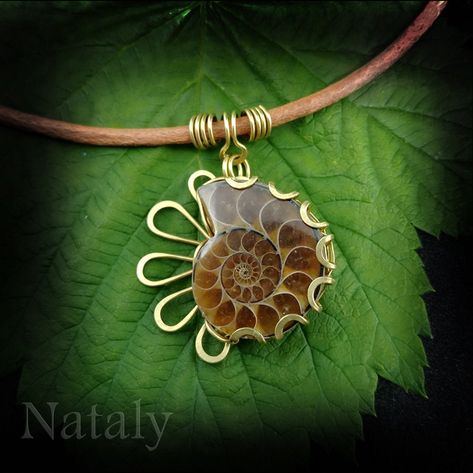 This listing is for stylish wire wrapped pendant with charming ammonite fossil. Looking for unisual minimalist necklace to spoil yourself or for gift? This fossil necklace is a great choice. Stylish double sided gemstone necklace is very versatile. You can wear it either with evening dress or casual blouse. Unique Boho necklace for women with style is absolutely eye-catching.  Order this beautiful ammonite necklace right now!  SIZE AND MATERIALS * The length of a pendant is 47mm (1.86'') Please Ammonite Necklace, Fossil Necklace, Ammonite Jewelry, Bling Things, Gemstone Choker Necklace, Wire Wrapped Stone Jewelry, Spiral Pendant, Wire Wrap Jewelry Designs, Pendant Ideas