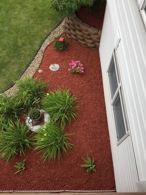 Adding stone and the red mulch. Lots of digging! But so worth it.. Red Lava Rock Landscaping Front Yard, Red Mulch Landscaping Front Yards, Red Mulch, Red Mulch Landscaping Ideas, Mulch Landscaping, Front Yards Curb Appeal, Pergola Pictures, Hillside Landscaping, Diy Landscaping