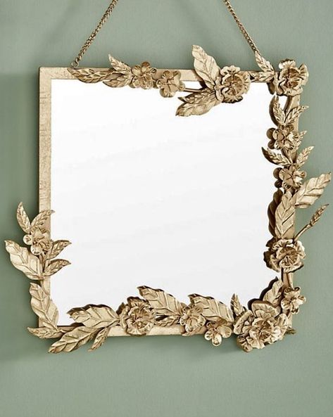 I made this Anthropologie inspired mirror and it was so easy and definitely cheaper than the real thing. There is a round frameless version and that’s what I was going to originally make, but my mirror had a scratch on it. Luckily I had another mirror I could use instead.       This is square mirror from Anthropologie that I used for my inspiration.    This is the mirror that I used.    I taped off the mirror and then used some small clear command clips where I wanted to attach the ga… Spiegel Diy, Rope Mirror, Mirror Frame Diy, Anthropologie Inspired, Mirror Crafts, Deco Studio, Diy Entryway, Mirror With Hooks, Gold Spray Paint