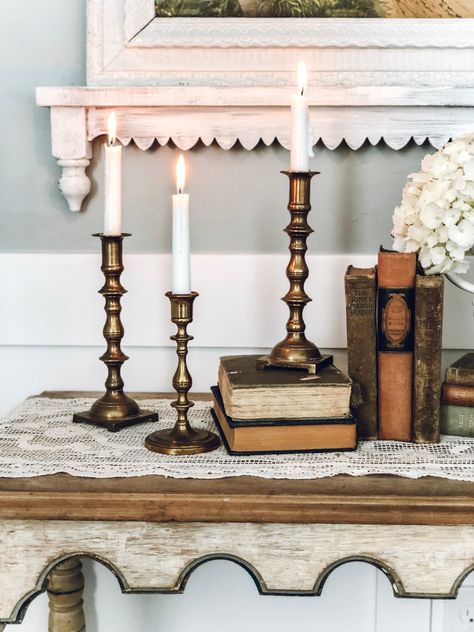 Adding Antiques To Modern Home, Candle Stick Decor Ideas, Mantle Inspiration, Banquet Design, Mantle Deco, Boston Apartment, Vintage Brass Decor, Candle Stick Decor, Antique Candles