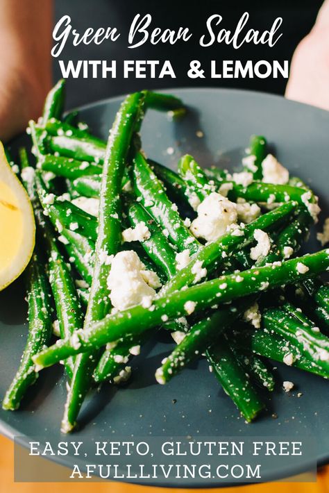 This Green Bean Salad with Lemon and Feta is light, refreshing and easy to make. A perfect salad or side dish to serve alongside any dinner. Four simple ingredients of green beans, feta cheese, lemon juice, and olive oil make this delicious side ready to go in 20 minutes. It's so easy, so anyone can make it any enjoy it, the perfect summertime side dish! #afulllivingketo #greenbeans #greenbeanrecipes #greenbeansalad #coldgreenbeansalad Green Beans Feta, Feta Green Beans, Bean Feta Salad, Green Beans With Feta, Green Bean Dishes, Baked Green Beans, Green Bean Salad, Lemon Salad, Lemon Recipe