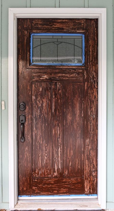 Faux Wood fiberglass door with gel stain! See how it turned out! It doesn't have to cost a lot to create a lovely faux wood fiberglass door. This works great to create faux wood garage doors too! #fauxwooddoor Gel Stain On Fiberglass Door, Gel Stain Front Door, Gel Stain Fiberglass Front Door, Faux Wood Exterior Door, Walnut Gel Stain Fiberglass Door, Faux Wood Front Door, Staining Fiberglass Door To Look Like Wood, Gel Stain Garage Door, Fiberglass Door Stain Wood Grain