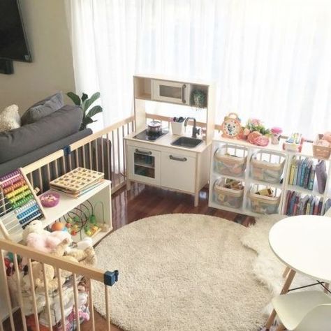 Organised Kids Play Area Idea-this is a simple playpen in our lounge room that I have progressively turned into a mini play room as my daughter got older. Starting small with a rug and a few toys when she was a baby it gradually grew with her through toddlerhood. Featuring Ikea's children's toy kitchen, play food, Eames replica table and chairs, jigsaws and many other fun things! Large Playroom, Playrooms Ideas, Kids Play Corner, Kid Friendly Living Room, Baby Play Areas, Small Playroom, Play Corner, Toy Room Decor, Living Room Playroom