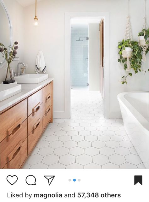 Love the honeycomb tile in the bathroom! Way to go Joanna Gaines! Honeycomb Tiles Bathroom, Tile In The Bathroom, Joanna Gaines Bathroom, Bathroom Floor Tile Ideas, Hexagon Tile Bathroom, Floor Tile Ideas, Honeycomb Tile, Bathroom Floor Tile, White Bathroom Tiles