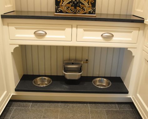 Creating a safe, comfortable space for Bruiser doesn’t have to mean your house has to literally go to the dogs. Here are eight options for c... Dog Station, Dog Food Station, Traditional Laundry Room, Red Cabin, Pet Feeding Area, Food Storage Cabinet, Pet Station, Kennel Ideas, Pet Room