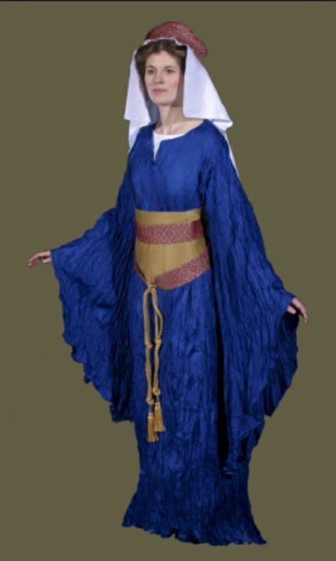 Bliaut: A undergarment that was worn by both men and women. Fitted in the chest and mid-section, lose around the arms and legs. Elven Fashion, Irish Clothing, The Crusades, Revival Clothing, Purple Wrap, Airy Dress, French Dress, Period Outfit, Medieval Clothing