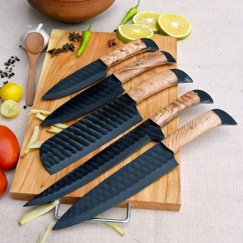 . "5 pcs Chef Knife Set Damascus steel Jet Black hammered kitchen knife set" Master your kitchen with our Damascus Steel Chef's Knife Set. This 5-piece collection features "razor-sharp blades" We bring you this beautiful Handmade Chef Set of 5 pieces. This beautiful Kitchen Knife Set is made by Hand and completely personalization option available. High quality Damascus Steel Razor Sharp Edge Blade Available on custom order . 🌐 Website Coming Soon ✉ DM for Orders & Inquiries #Damoxus #Knives ... Damascus Chef Knives, Kitchen Knife Set, Chef Knife Set, Anniversary Gift For Him, Leather Roll, Damascus Knife, Wood Handles, Knife Set Kitchen, Knife Handles