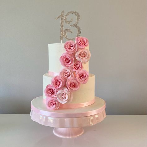 White buttercream cake with pink gumpaste roses Birthday Cake For 13 Year Girl, 13 Year Girl Birthday Cake, Cake For 13th Birthday Girl, 13th Birthday Cake Girl, White Buttercream Cake, Gumpaste Roses, 13th Birthday Cake, 13 Year Girl, White Birthday Cakes