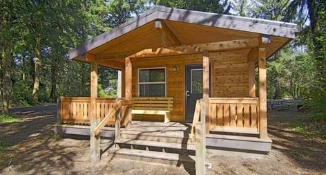 The park has a large campground with 174 hook-up sites, 302 electrical sites, 6 tent sites, 15 yurts, and 11 cabins. Oregon Coast Camping, Cheap Camping, State Park Cabins, Burney Falls, Camping In Ohio, Oregon State Parks, River Cabin, Fall Camping, Little Cabin