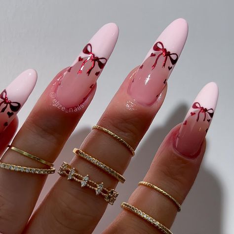 Putting bows on everything all 2024 🎀 Hand painted little cuties by meeeeee❣️ #nails #nailinspo #valentinesnails #bow #bownails… | Instagram Cute Valentine’s Day Nails Aesthetic, Christmas 2025 Nails, Pink Bow Nails Christmas, Christmas Long Almond Nails, Valentine Nails Designs Almond Shape, Winter Nails Long Almond, Cute Almond Nails Winter, Pink And Red Stiletto Nails, Pearl Valentine Nails