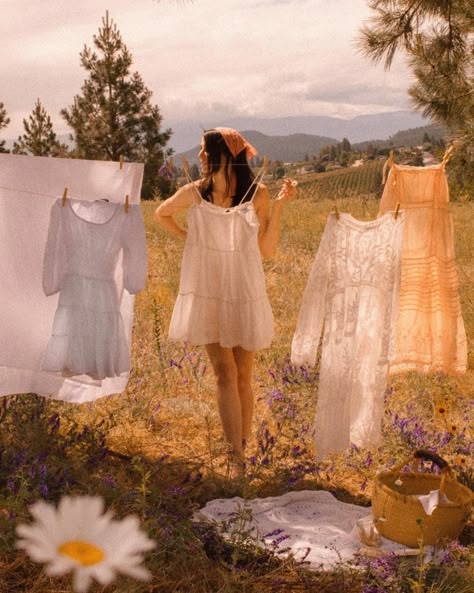 Christina Loewen on Instagram: “Wildflowers and sunshine 🌼” Clothesline Photoshoot, Laundry Photoshoot, Cottage Core Photoshoot, Countryside Dress, Cottagecore Photoshoot, Laundry Shoot, Indie Photography, Line Photography, Spring Photoshoot