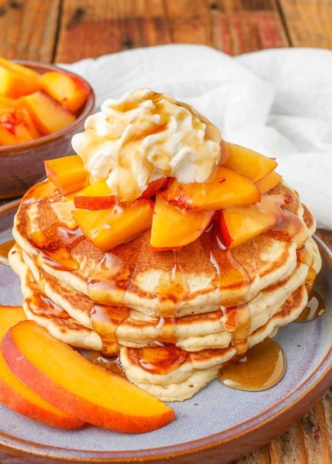 Succulent peaches and warm, fluffy pancakes, what’s not to love? These Peach Pancakes are a breakfast lover’s dream come true. Peach Pancakes Have you ever bitten into a ripe summer peach and felt its sweet, juicy nectar dribble down your chin? That kind of memory reminds me of childhood. And, this peach pancake recipe captures… Get the recipe for Peach Pancakes! Amish Breakfast Casserole, Rhubarb Crunch, Applesauce Pancakes, Peach Pancakes, Banana Chocolate Chip Pancakes, Easy Chicken Fajitas, Easy Custard, Easy Christmas Candy Recipes, Fruit Pancakes