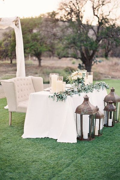 Sweethearts table with lanterns and greenery Vintage Sweetheart Table, San Juan Capistrano Wedding, Bride Groom Table, Wedding Reception Seating, Sweetheart Table Wedding, Reception Seating, Outdoor Wedding Reception, Organic Wedding, Rustic Country Wedding