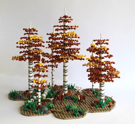 https://flic.kr/p/2hnETK5 | Birch Forest in fall (with Grantmaster's mini deer design) | Fall setting in a Birch forest with Grantmaster's  mini deer design. I just built a forest setting for it. I also built a doe left of the buck with it's head tilted down as it grazes. Lego Rivendell, Lego Forestmen, Lego Mountain, Lego Trees, Forest In Fall, Lego Plants, Lego Tree, Lego Masters, Lego Techniques