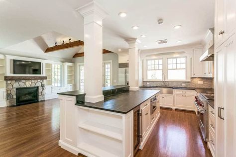 If the pass through wall is load-bearing, you could do a traditional kitchen island with support columns to ceiling Islands With Columns, Column In Kitchen, Kitchen Island Ideas With Columns, Kitchen Island With Columns, Kitchen Columns, Traditional Kitchen Island, Kitchen Island With Sink, Luxury Properties, Small Kitchen Island