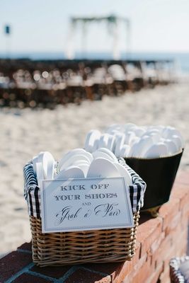 basket flip flops guests beach wedding gift white shoes sand oceanside california Wedding Locations California, Diy Beach Wedding, Simple Beach Wedding, Beach Wedding Gifts, Wedding Flip Flops, Beach Wedding Cake, Wedding Beach Ceremony, Beach Wedding Photos, Wedding Favors Cheap