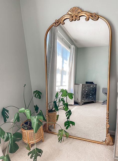 <p>Add inviting appeal to your space with our <strong>Vintage Inspired Floral Arched Wall Mirror</strong>. Drawing its inspiration from the past, this arched mirror is full of vintage charm, with its distressed gold finish, curved frame, and decorative floral detailing. Reflect your style beautifully in any room with this decorative accent mirror.</p> Entry Way Mirror And Table, Big Vintage Mirror Living Rooms, Vintage Floor Mirror Bedroom, Gold Standing Mirror Vintage, Big Fancy Mirror, Large Mirror Gold, Vintage Standing Mirror Aesthetic, Accent Mirrors Bedroom, House Mirror Ideas