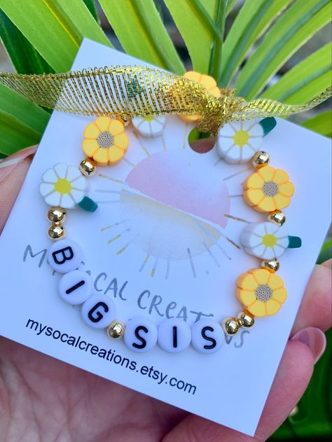 Excited to share this item from my #etsy shop: Daisy Name Bracelet, Big Sis Bracelet, Floral Beaded Bracelet, Toddler Girl Sunflower Bracelet, Big Sister Gift, Personalized Gift for Girls Kids Beaded Bracelets, Daisy Name, Sunflower Bracelet, Kindergarten Gifts, Girls Personalized Gifts, Big Sister Gifts, Trendy Bracelets, Big Sis, Polymer Clay Flowers