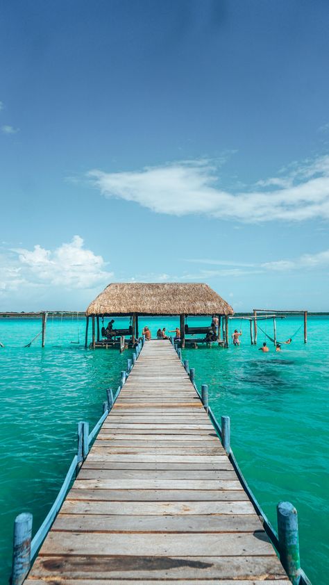 A budget friendly guide to Bacalar, Mexico — Solo budget traveller | Content Creator Places In Mexico, Backpacking Destinations, Action Board, Mexican Beach, Mexican Beaches, Long Lake, Full Time Travel, Beautiful Places To Travel, Mexico Travel