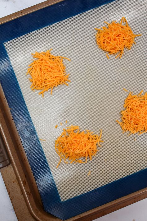 Melted Cheese Crisps, Keto Cheddar Crackers, Baked Cheddar Crisps, Homemade Cheese Chips, Crispy Cheese Wafers, How To Make Cheese Crisps In The Oven, Shredded Cheese Crisps, Homemade Cheese Whisps, Baked Cheese Snacks