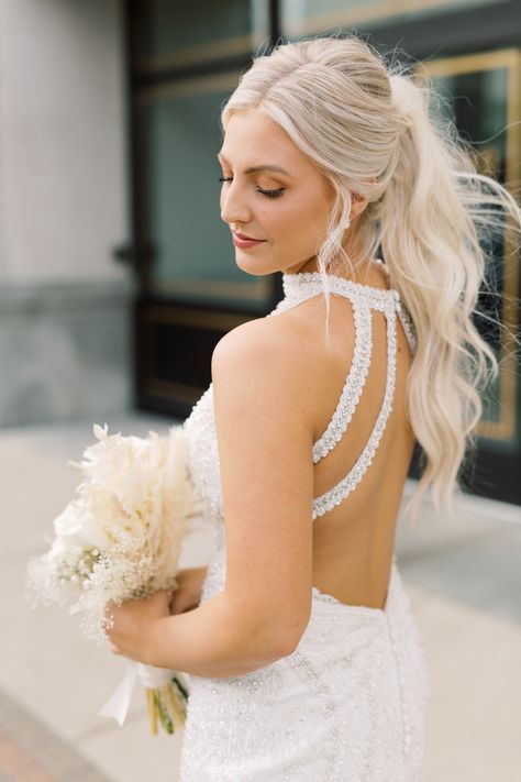 Updo Wedding Hair Ponytail, Bride Hair High Ponytail, High Neck Dress Updo Hairstyles, Styled High Ponytail, Wedding Hair For Bride Ponytail, Bridesmaid Hairstyles Ponytail Curls, Prom Curled Ponytail, High Neck Wedding Hairstyles, Hair For High Neck Dress Wedding