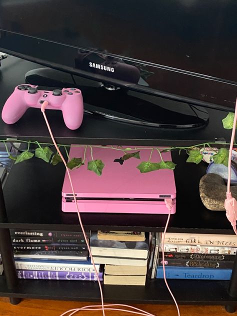 #pink #playstation #ps4 #pinkps4 #pinkplaystation #tropical #vines #books #gamesetup #roominspiration #aesthetic #ps4skin #skin Ps5 Console Aesthetic, Aesthetic Playstation, Pink Playstation, Ps5 Cover, Console Aesthetic, Ps5 Setup, Tropical Vines, Games Ps4, Ps5 Console