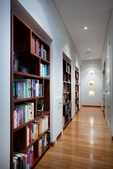 31 Wonderful Hallway Ideas to Revitalize Your Home | Home Remodeling Contractors | Sebring Design Build Asymmetrical Interior, Shelf Designs For Hall, Recessed Wall Niche, Hallway Shelf, Unique Bookshelves, Contemporary Shelving, Hallway Cabinet, Home Remodeling Contractors, Bookcase Design