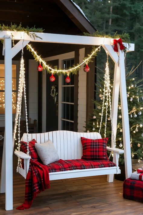 25 Outdoor Christmas Decor Ideas to Transform Your Home in 2024 - Cabin Nook Christmas Porch Swing Decorations, Reindeer Sculpture, Outdoor Christmas Decor Ideas, Pictures On String, Outdoor Christmas Decor, Pallet Christmas Tree, Classic Christmas Decorations, Pallet Christmas, Snow Flakes Diy