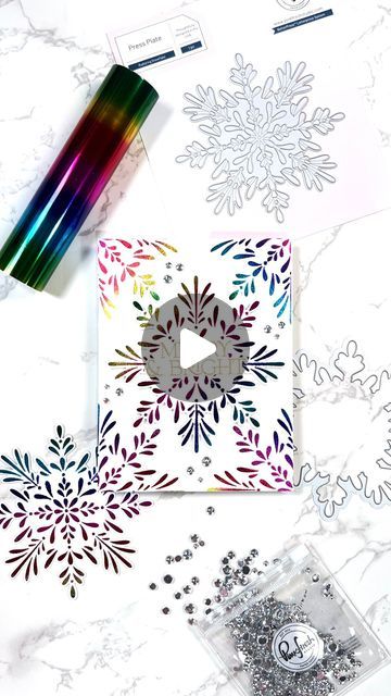 Pinkfresh Studio™️ on Instagram: "Create quick & easy cards with our new Radiating Snowflake product suite! The press plate design is a dual purpose product, meaning it can be used on both hot foil systems and the BetterPress Letterpress machine for fast and fun techniques that pack a punch. @erica_cacacraft created this rainbow snowflake card by foiling the press plate with rainbow striped foil, then adding a gold heat embossed sentiment! We hope you enjoyed a quick look into how it came to life!  #pinkfreshstudio #hotfoiling #diecutting #cardsofinstagram #christmascards" Heat Embossing Ideas, Foiled Cards, Hot Foil Cards, Foil Christmas Cards, Letterpress Machine, Diy Dye, Snowflake Cards, Foil Cards, Plate Design