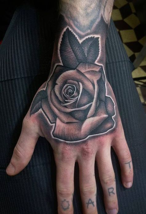 Rose tattoo 20 ideas for men: Unlocking masculine symbolism and timeless elegance Black And Grey Rose Tattoo Realistic, Rose Tattoo For Hand, Rose Tattoo In Hand, Rose Reference Black And Grey, Angel Rose Tattoo, Shading Tattoo Ideas, Rose Tattoo Realistic, Realism Rose Tattoo, Rose Tattoo Black And Grey