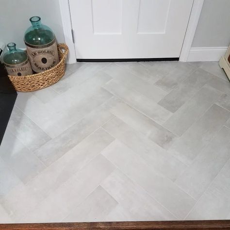 Light Gray Herringbone Tile Floor, White Tile Entryway Floors, Back Door Tile Entry, Tiles For Foyer Entryway, Front Foyer Flooring Ideas, Front Hall Flooring Ideas, Mudroom Ideas Entryway Tile, Ceramic Tile Entryway, Herringbone Tile Foyer