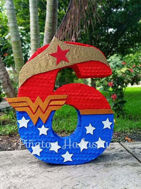 Wonder Woman Pinata, Wonder Woman Birthday Party Ideas, Wonder Woman Party Ideas, Supergirl Birthday, Homemade Pinata, Monster Inc Cakes, Wonder Woman Birthday Party, Women Party Ideas, Wonder Woman Party