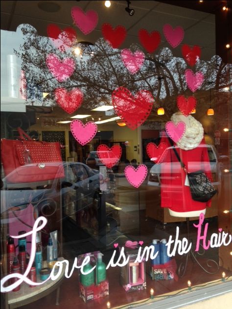 Love is in the Hair! front window display Divine Salon & Spa  Ripon, Ca Salon Window Display, Valentines Window Display, Diy Valentinstag, Love Is In The Hair, Store Front Windows, Rene Furterer, Hair Front, Window Display Retail, Valentine's Day Decorations