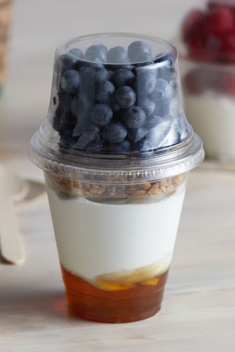 Filling up your takeaway station near your cash register can promote impulse purchases! A favorite we love is using disposable plastic cups to create parfaits or overnight oats as healthy snack options to go. Click the link below to start making your healthy snack ideas. Parfait To Go, Smoothie Garden, Walking Snacks, Snack Combos, Fridge Stock, Healthy Food Packaging, Plastic Cups With Lids, Parfait Bar, Fruit And Yogurt Parfait