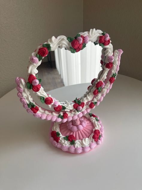 "This cake is perfect for bathroom selfies, on a cute shelf or on a vanity <3 Products used: lightweight spackle, acrylic paint, mirror,  Dimensions: 9.7\"L x 5.8\"W" Wood Projects Cute, Crafts Using Spackle, Paper Mache Room Decor, Cute Vanity Mirror, Valentines Heart Cake, Food Mirror, Diy Girly Crafts, Decorating Mirror, Cake Mirror