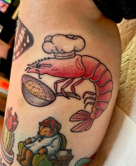 Foodie Tattoos on Instagram: "Food tattoo by @jin_ink_ #foodtattoo #foodtattoos #foodietattoo #foodietattoos #prawntattoo #shrimptattoo" Shrimp Tattoo Ideas, American Traditional Food Tattoo, Traditional Shrimp Tattoo, Cute Food Tattoos, Traditional Food Tattoo, Cooking Tattoos, Food Tattoo Ideas, Foodie Tattoo, Goofy Tattoos