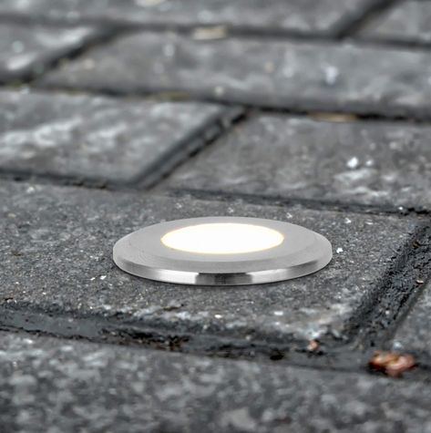 Whether you’re looking for low profile pathway lights, LED driveway lights, or totally unique driveway lighting ideas, it’s not exactly an easy search... | In-Ground Paver Lights #DrivewayLightingIdeas #DrivewayLighting #Driveway #Lighting #Driveway #DecoratedLife Driveway Lights, Paver Lights, Walkway Lighting, In-ground Lights, Driveway Lighting, Pathway Lights, Solar Pathway Lights, Retro Revival, Concrete Driveways