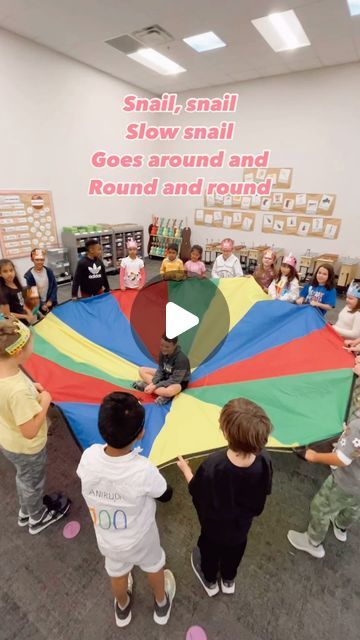 Hannah Zimmermann on Instagram: "Snail, Snail - parachute activity 🙌🏻 The kids love this so much that we usually do this in kinder and 1st, but here I even pulled it out for 2nd! I use this to either prep so and mi or prep la. It’s also great for quarter notes and eighth notes OR to have a discussion about tempo. As we learn this song, I like to have the students move around the room like a slow snail. Then I will ask them what other slow animals there are? We’ll act those out too, and before you know it - the kids are writing their own lyrics. Talk about getting your bang for your buck in a song 💰  #elementarymusiceducation #elementarymusic #elementarymusicteacher #elementarymusicrocks #iteachmusic #fisdfineartsleads #fisdelevate #musiced #musiceducation #musiceducationmatters #musicte Music And Movement For Preschoolers, Moving Activities For Preschoolers, Snail Activity For Preschool, Snail Preschool Activities, Parachute Activities For Preschool, Parachute Songs For Preschool, Creative Movement Activities For Kids, Parachute Games For Preschoolers, Snail Activities For Kids